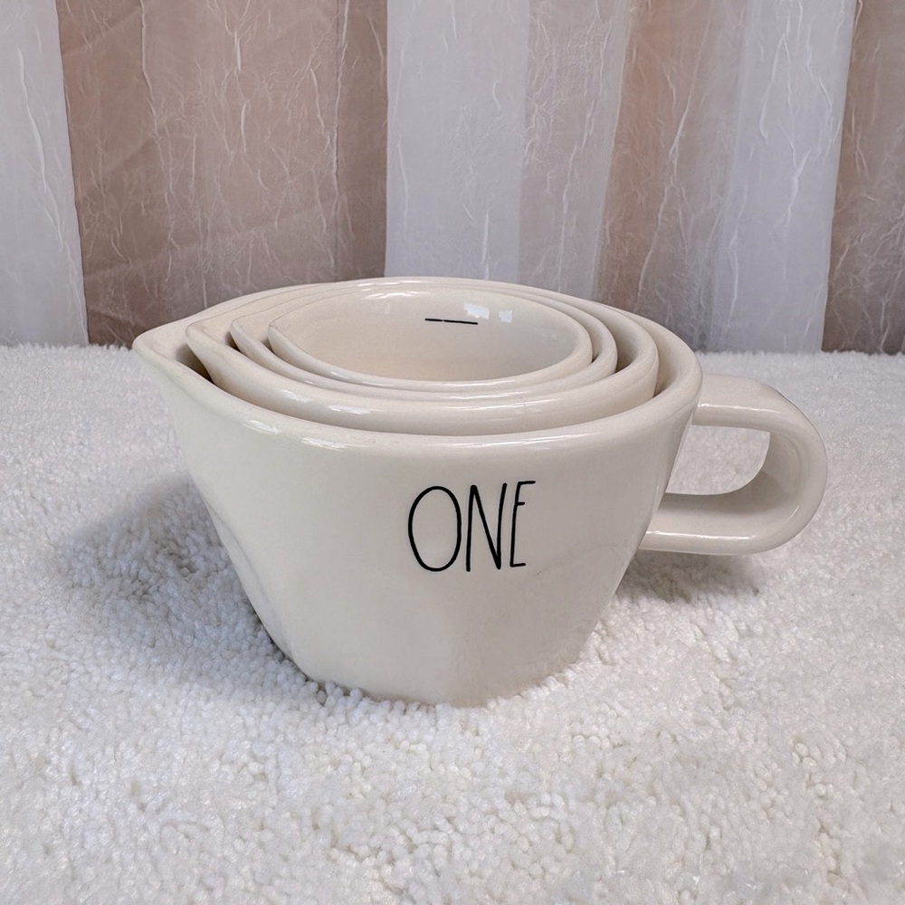 Rae Dunn Artisan Collection Measuring Cups. 4-Piece Set of White Ceramic Cups.
